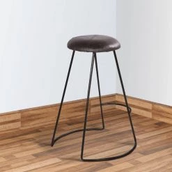 Modern 25.5 in. Black Metal Frame Backless Bar Stool with Genuine Leather Upholstery and Baseball Stitching by The Urban Port -The Urban Port Sales black the urban port bar stools upt 266369 fa 1000