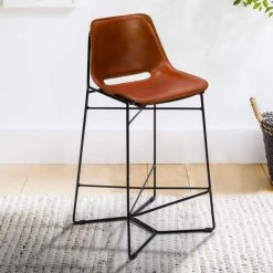 39 in. Tan Brown and Black Metal Frame Bar Stool with Curved Genuine Leather Seat by The Urban Port -The Urban Port Sales brown and black the urban port bar stools upt 263784 31 1000