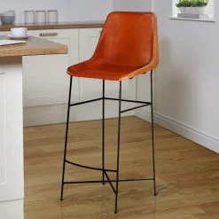 44 in. Tan Brown and Black Bar Chair with Leather Upholstery and Tubular Frame by The Urban Port -The Urban Port Sales tan brown and black the urban port bar stools upt 263267 76 1000